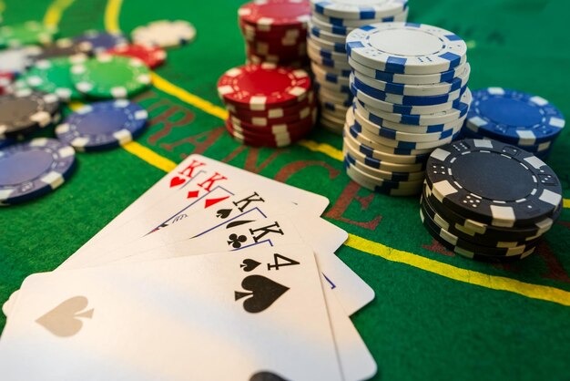 Chips and cards at eurotogel Texas Poker table Close-up of poker chips and cards on a eurotogel table